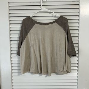 Neutral color poncho style top. Three quarter length sleeves. Size Small